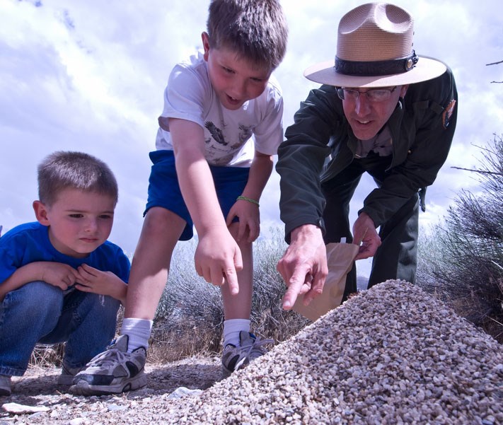 This park ranger is using the ZPD to increase these boys understanding.^[[Image](https://www.nps.gov/grba/learn/index.htm) by the [National Park Service](https://www.nps.gov/index.htm) is in the public domain]