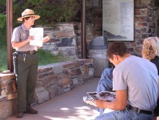 Seasonal ranger speaking to visitors