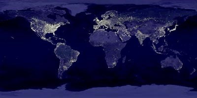 View of the earth from space at night, showing distribution of light pollution.