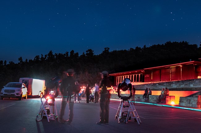 Astronomy program in front of a visitor center