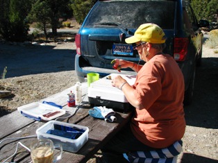 Artist Kay Malouff designing a stained glass window