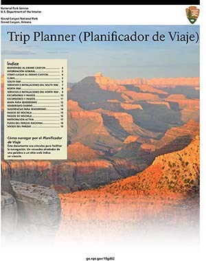 cover of Spanish language Trip Planner shows sunset scene of Grand Canyon landscape