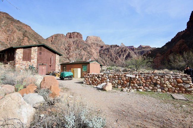 A design team member looks at the Phantom Ranch Reclamation Facility during a site visit for the Transcanyon Waterline project in January 2022.