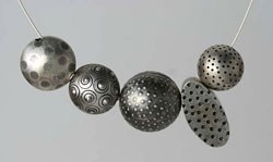 mixed silver beads by Erica Stankwytch Bailey