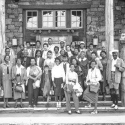 African-American group on steps in front of building