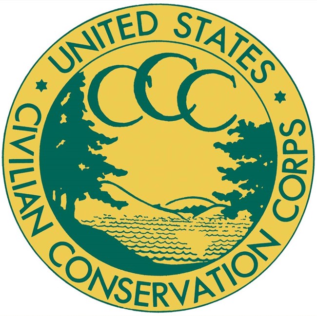 CCC logo, yellow circle with green outlines of mountains and trees inside
