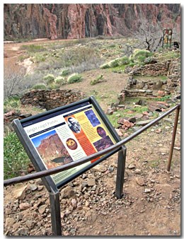 Bright Angel Site wayside panel 1 with pueblo behind.
