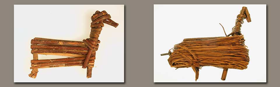 Two split-twig figurines made from willow branches bent into the shape of game animals (left - deer and right sheep) Two split-twig figurines made from willow branches bent into the shape of game animals (left - deer and right sheep)