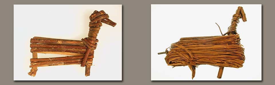 Two split-twig figurines made from bent willow branches made into the shape of game animals (left - deer and right sheep)