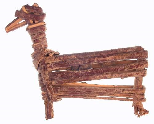 A small animal figurine handmade by bending and twisting split willow twigs. A small animal figurine handmade by bending and twisting split willow twigs.