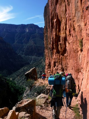 Youth participant backpacking down into Grand Canyon.