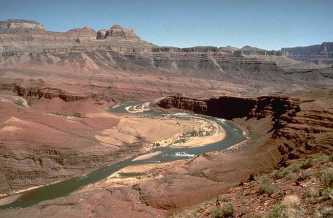 Colorado river through red stone.