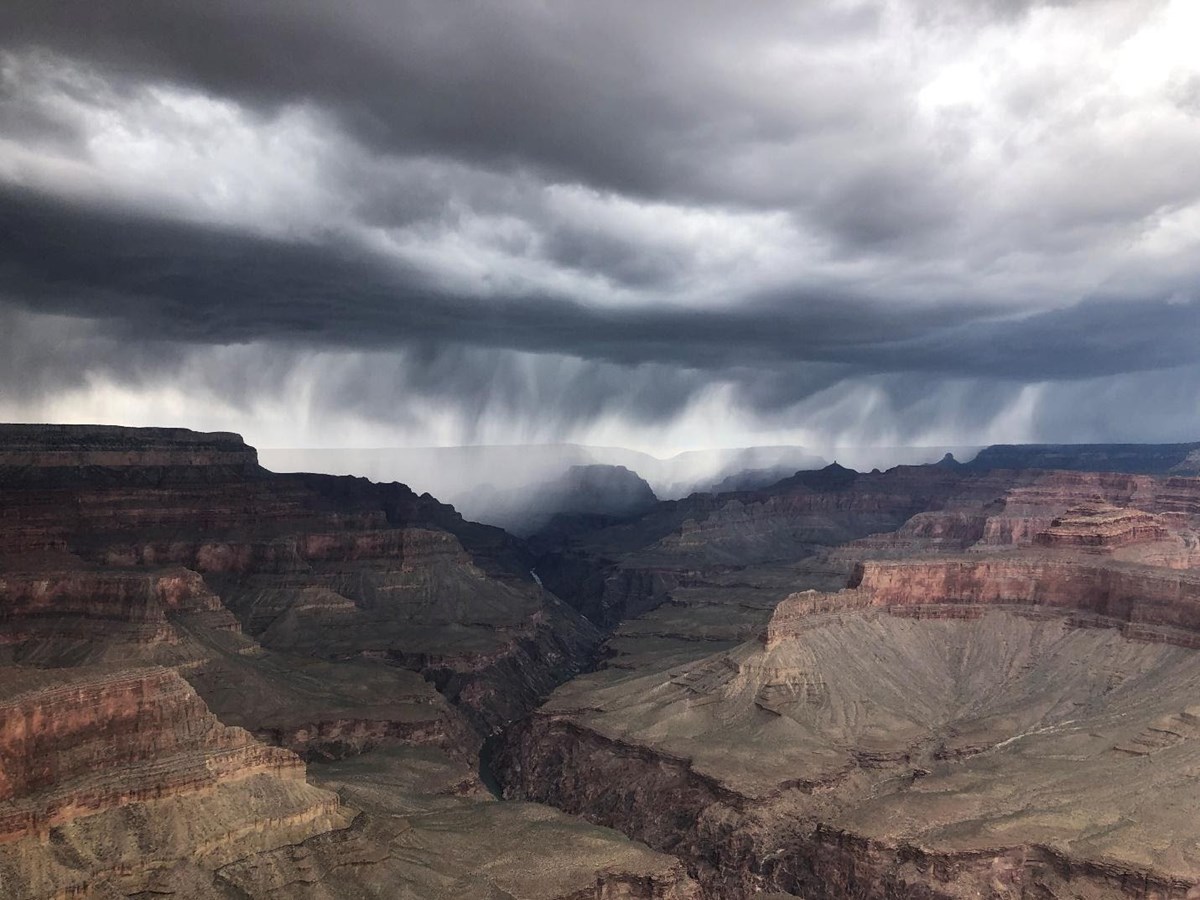 Dark rain clouds descend in inner canyon