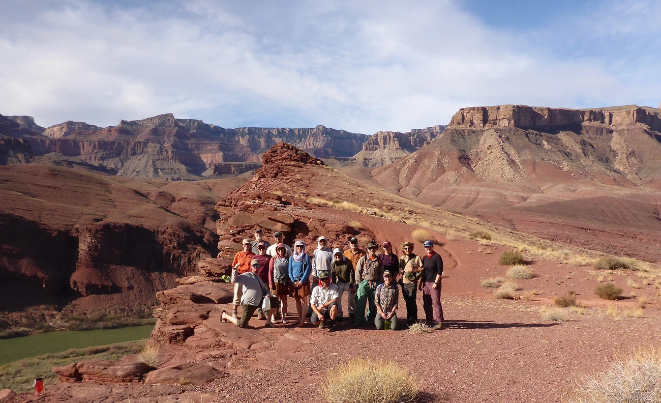 January 2018 Cardenas Camp Restoration Project. Restoration crew posing in front of Colorado river overlook.