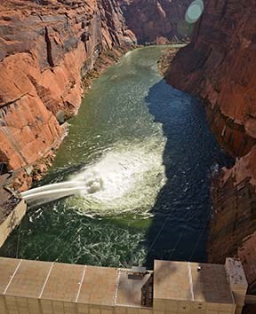 Looking down from Glen Canyon dam during 2012 HFE with tubes open.