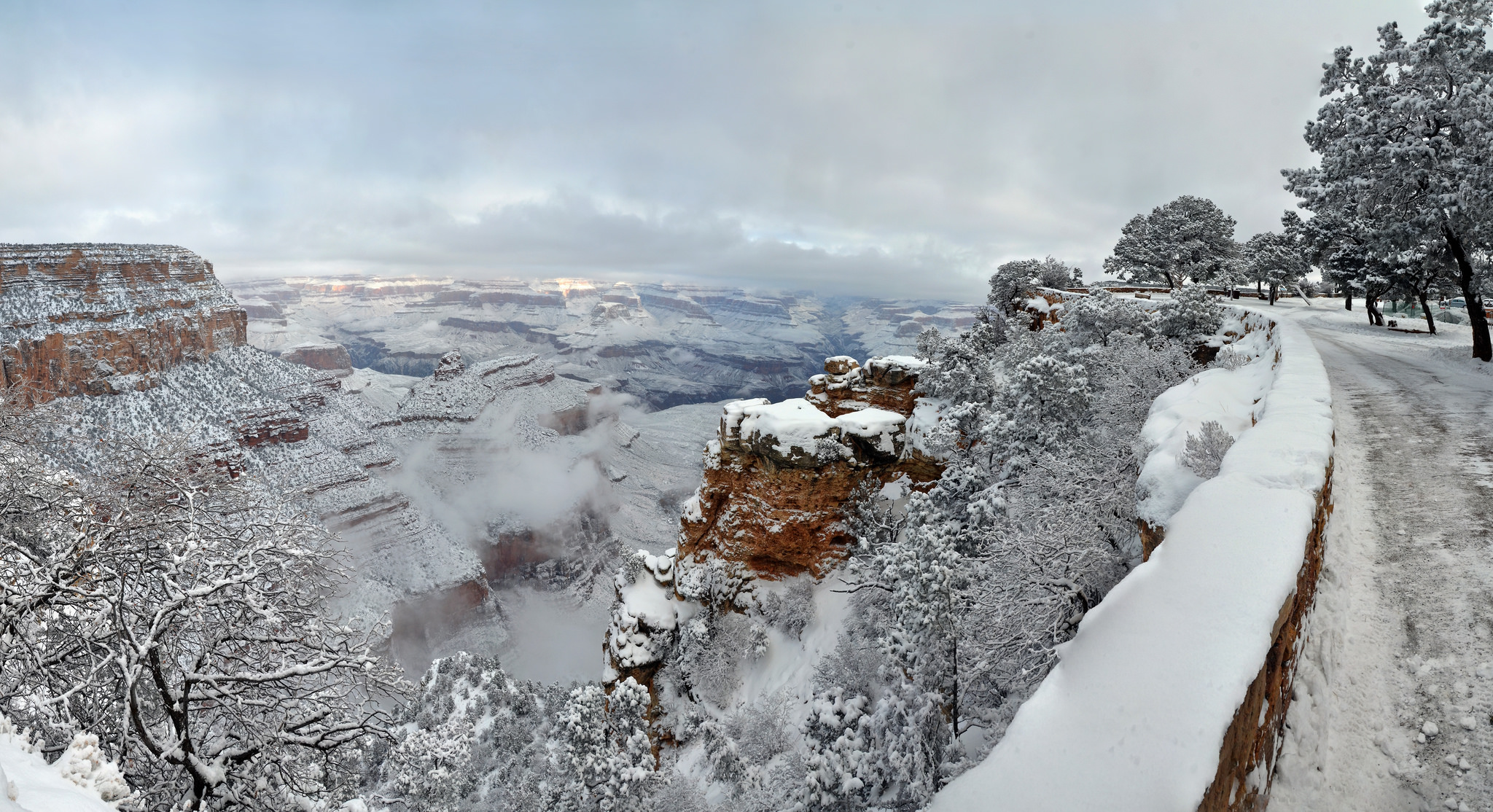 A snowy Grand Canyon as seen from the Rim Trail