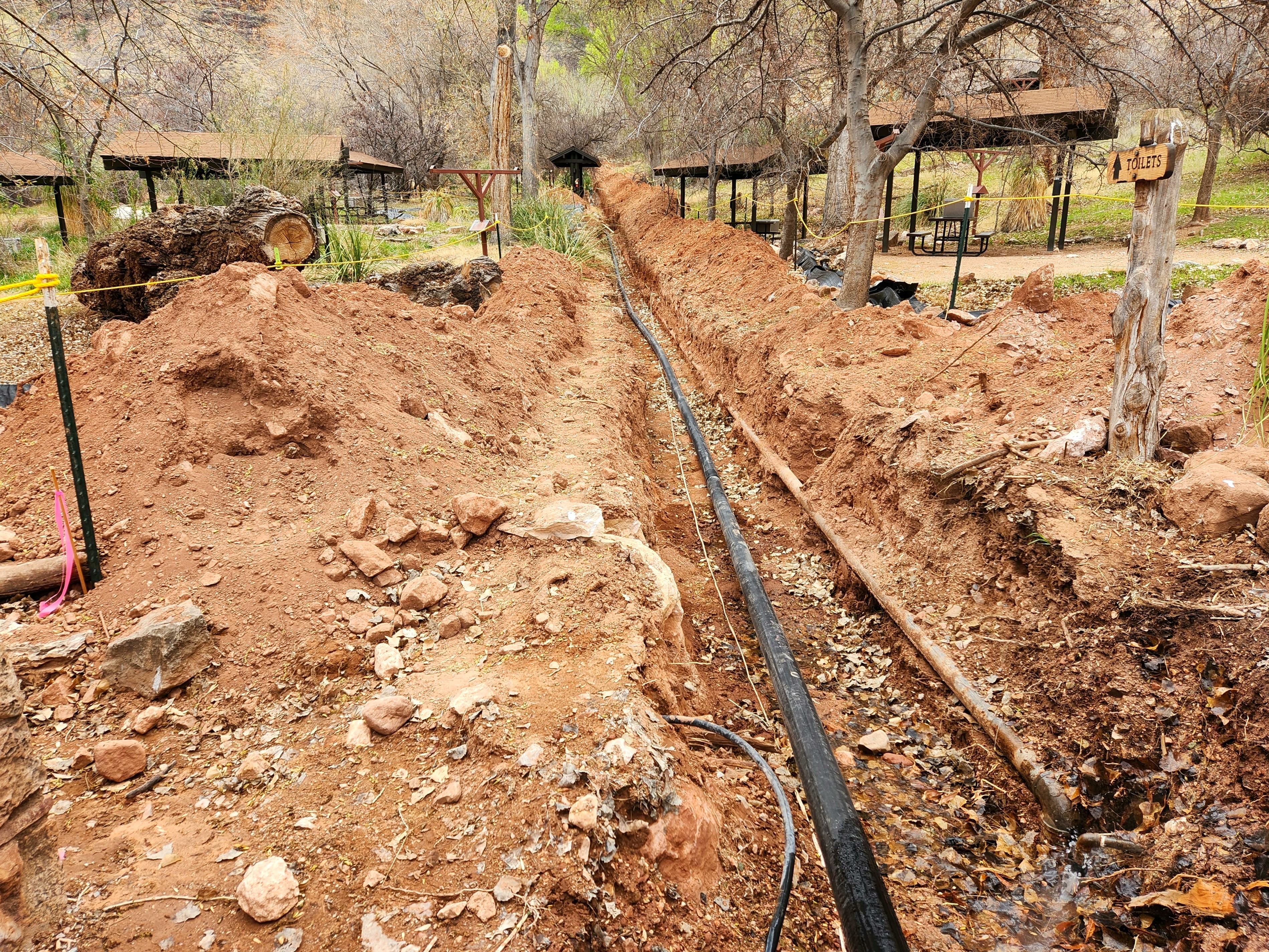 Trench work through Havasupai Gardens Campground A trench is dug through the Havasupai Gardens campground for the new water distribution line