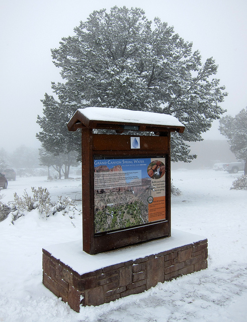 Water bottle filling station under snow