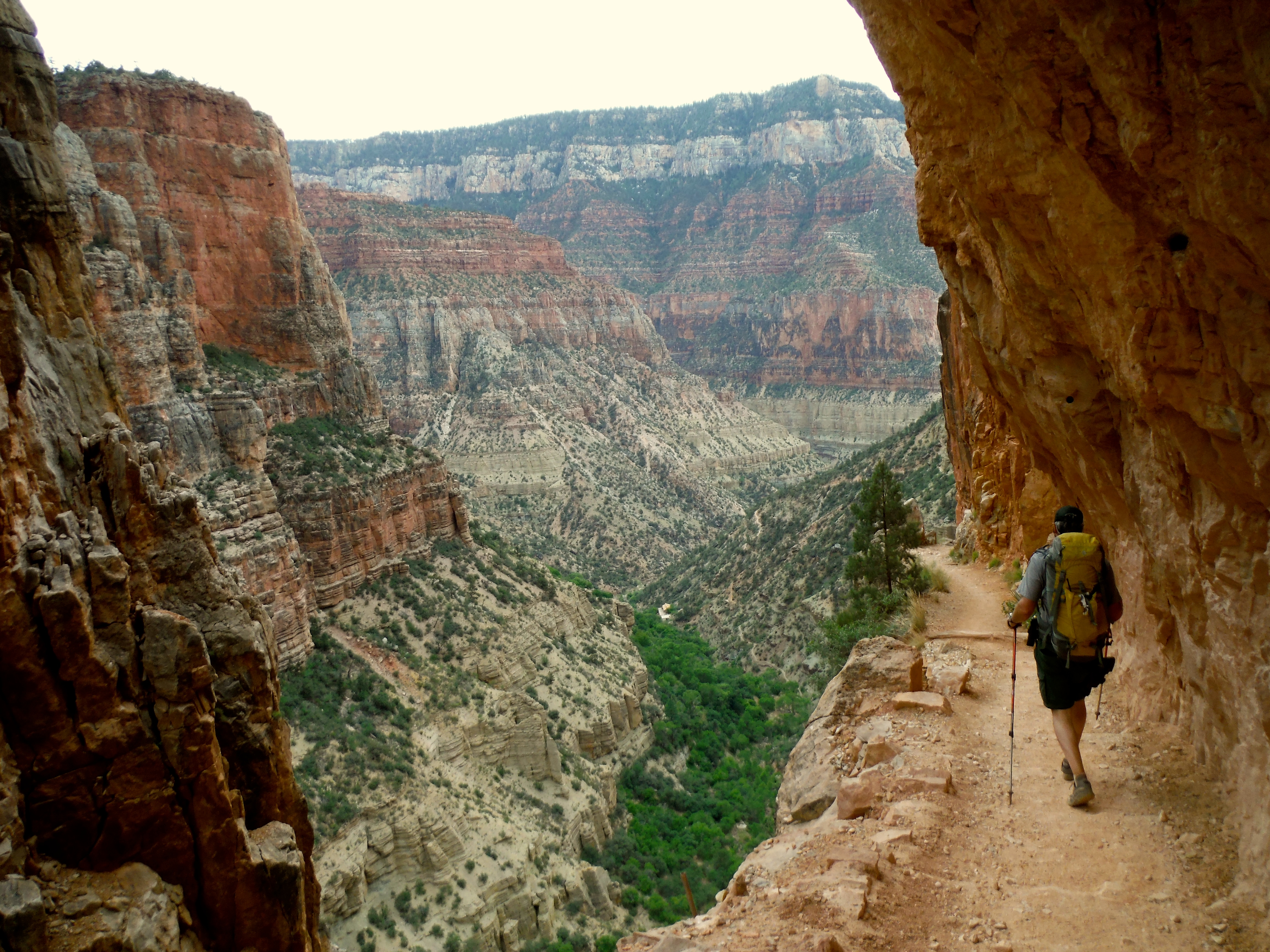 An NPS Ranger descends the North Kaibab Trail below Supai Tunnel