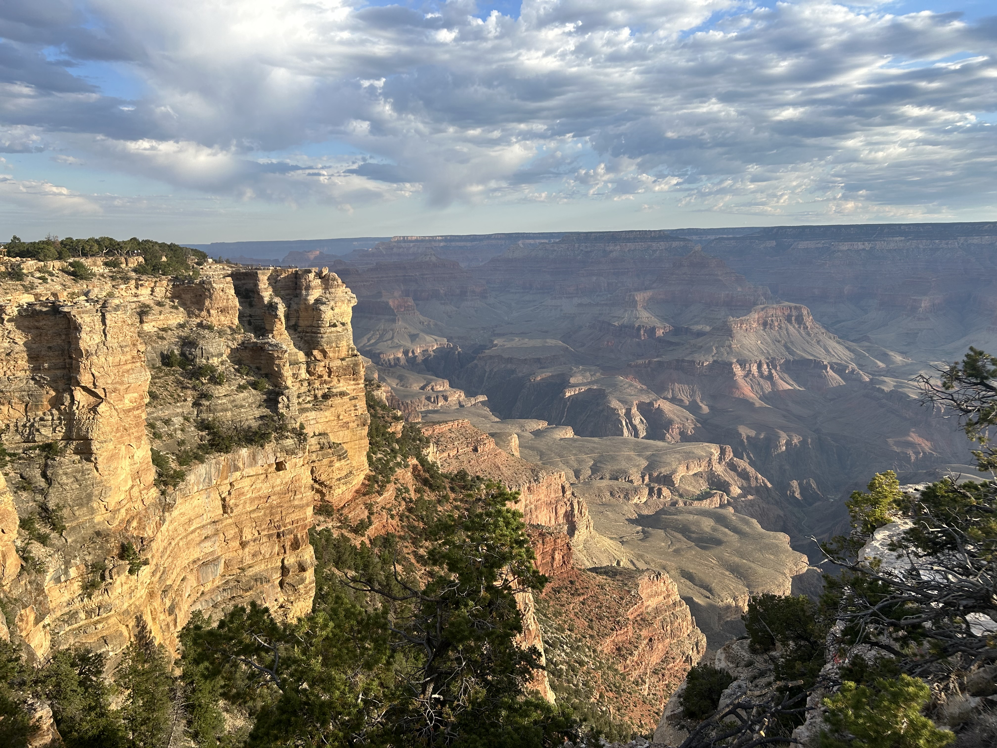 Mather Point Sunrise Mather Point is seen at sunrise from a distance