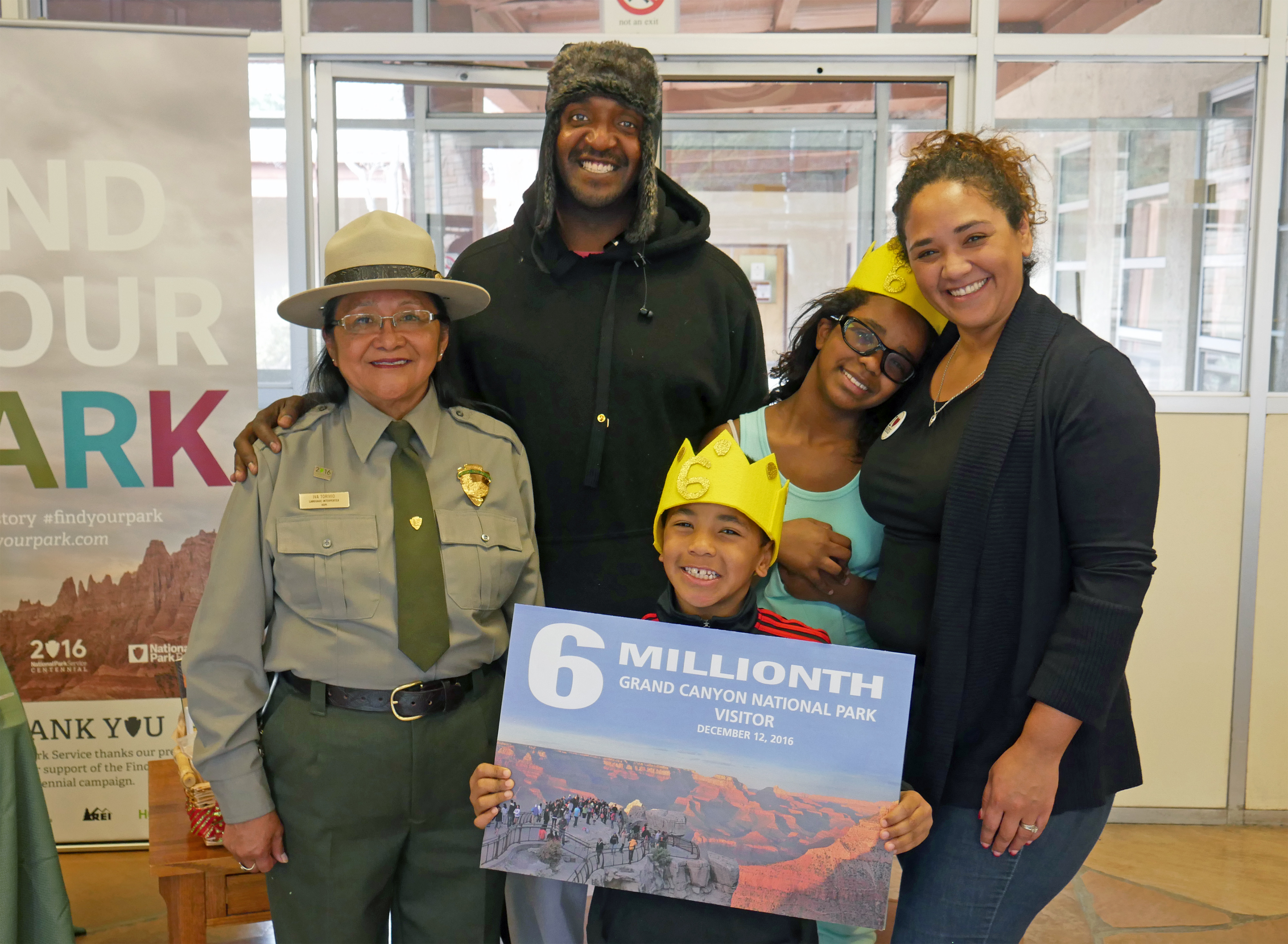 Park ranger Iva Torivio welcomes the Johnson family