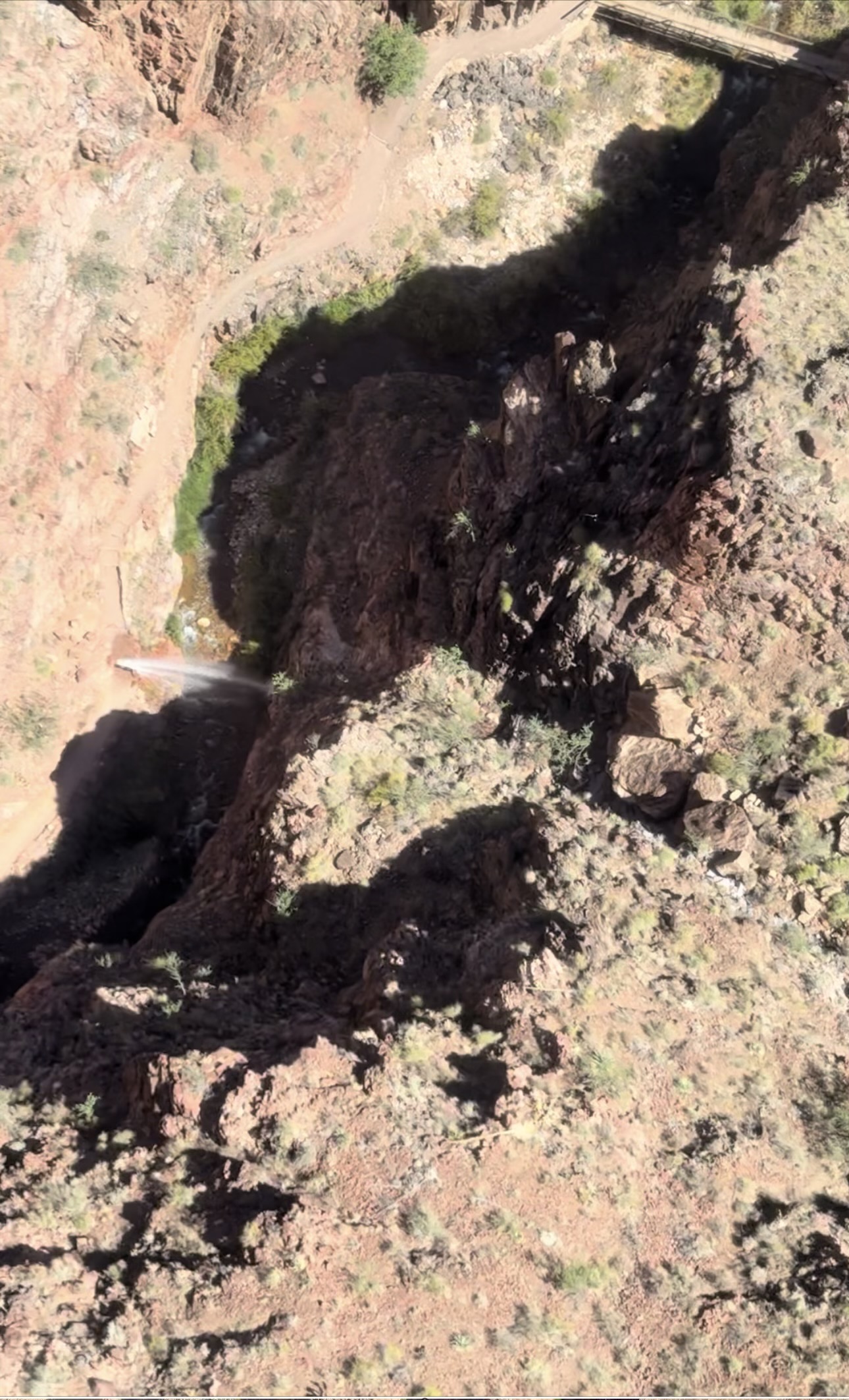 TCPL Break 8-20-24 A massive geyser of water is seen shooting out of a canyon trail