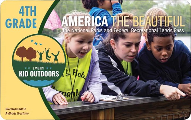 The 2022-2023 4th Grade Pass with the Every Kid Outdoors logo on the left and a photo of three 4th graders leaning over a railing and looking and pointing at something.