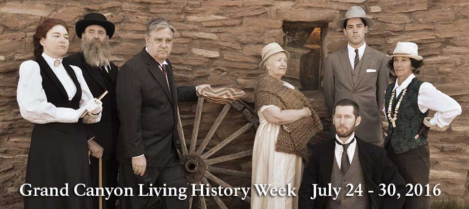 Wearing turn of the 19th Century clothing, 7 members of the Echoes From the Canyon living history production are posing in front of an adobe wall. A large wooden wagon wheel is in the center of the photo. Wearing turn of the 19th Century clothing, 7 members of the Echoes From the Canyon living history production are posing in front of an adobe wall. A large wooden wagon wheel is in the center of the photo.