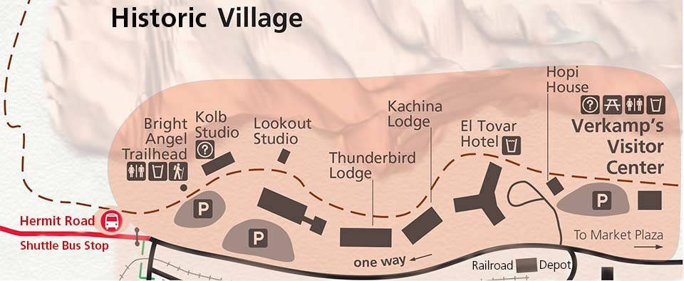 map of village showing 8 buildings and 3 parking lots along the edge of a canyon with the historic district shaded orange.