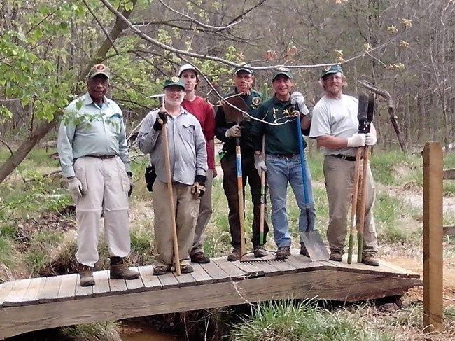 Trail Crew bridge and crew