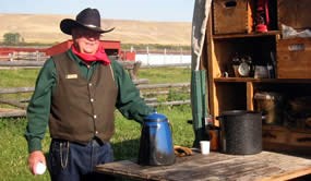 One of our summer volunteers presenting chuckwagon cook programs.