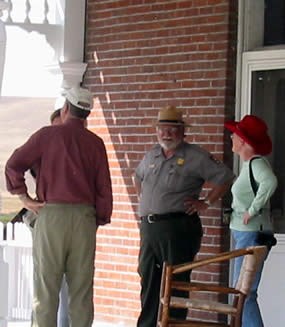 Park ranger answering visitor questions.