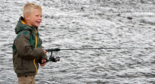 Young boy fishing