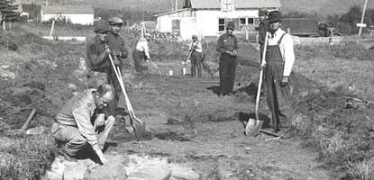 MHS archeologist Ralph Brown shown with Ojibwe assitants from Grand Portage.