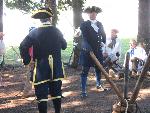 Re-enactors participate in a "Beginning Swordsmanship" workshop in the historic encampment.
