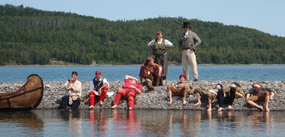 Voyageurs rest on spit of Grand Portage Island. Voyageurs rest on spit of Grand Portage Island.