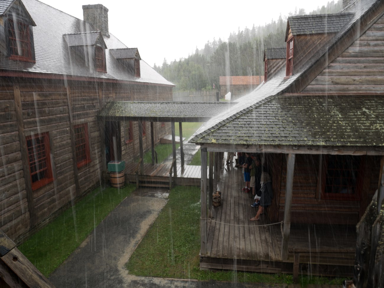 Aerial view of historic buildings with rain falling.