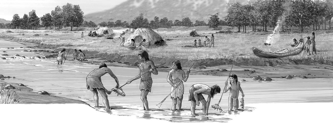 An Archaic era family fishes in the foreground while other people work on a boat and tend to pithouses. There are trees and mountains in the background.