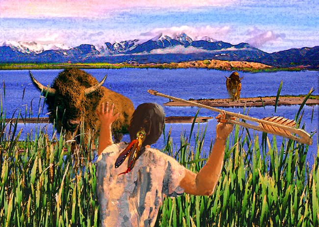 A Folsom-era hunter prepares to launch a spear from an atlatl at a large prehistoric bison at the edge of a large lake. The dunes and snowcapped mountains are in the distance.