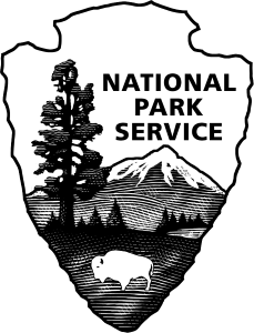 Black and White NPS Arrowhead logo with sequia tree, mountain, bison and text National Park Service