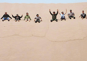 Scientists creating an avalanche to record "singing sand" phenomenon