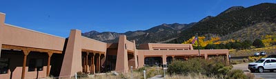 Visitor Center in Fall View of Visitor Center with Mountains in Background