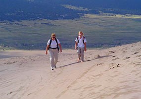 hikers on the dunes