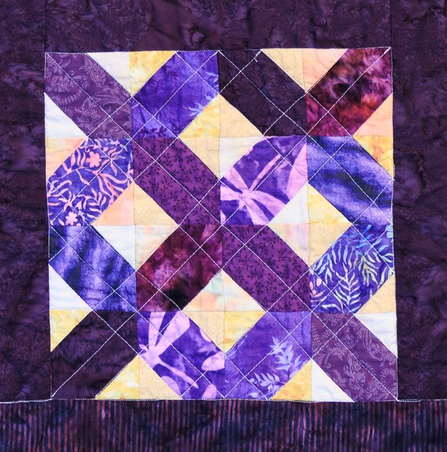Road to Tennessee quilt block in purple.