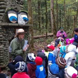 Ranger and students in front of talking chimney