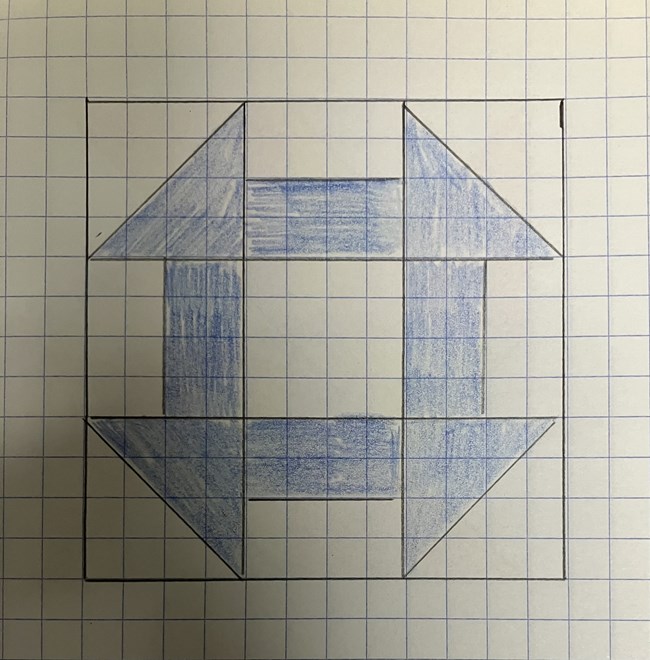 A drawing of a churn dash block.