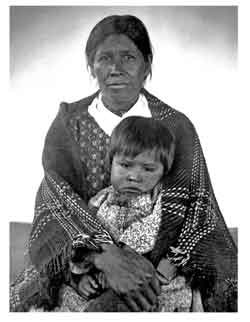 1888 photo of a Cherokee woman holding a child in her lap
