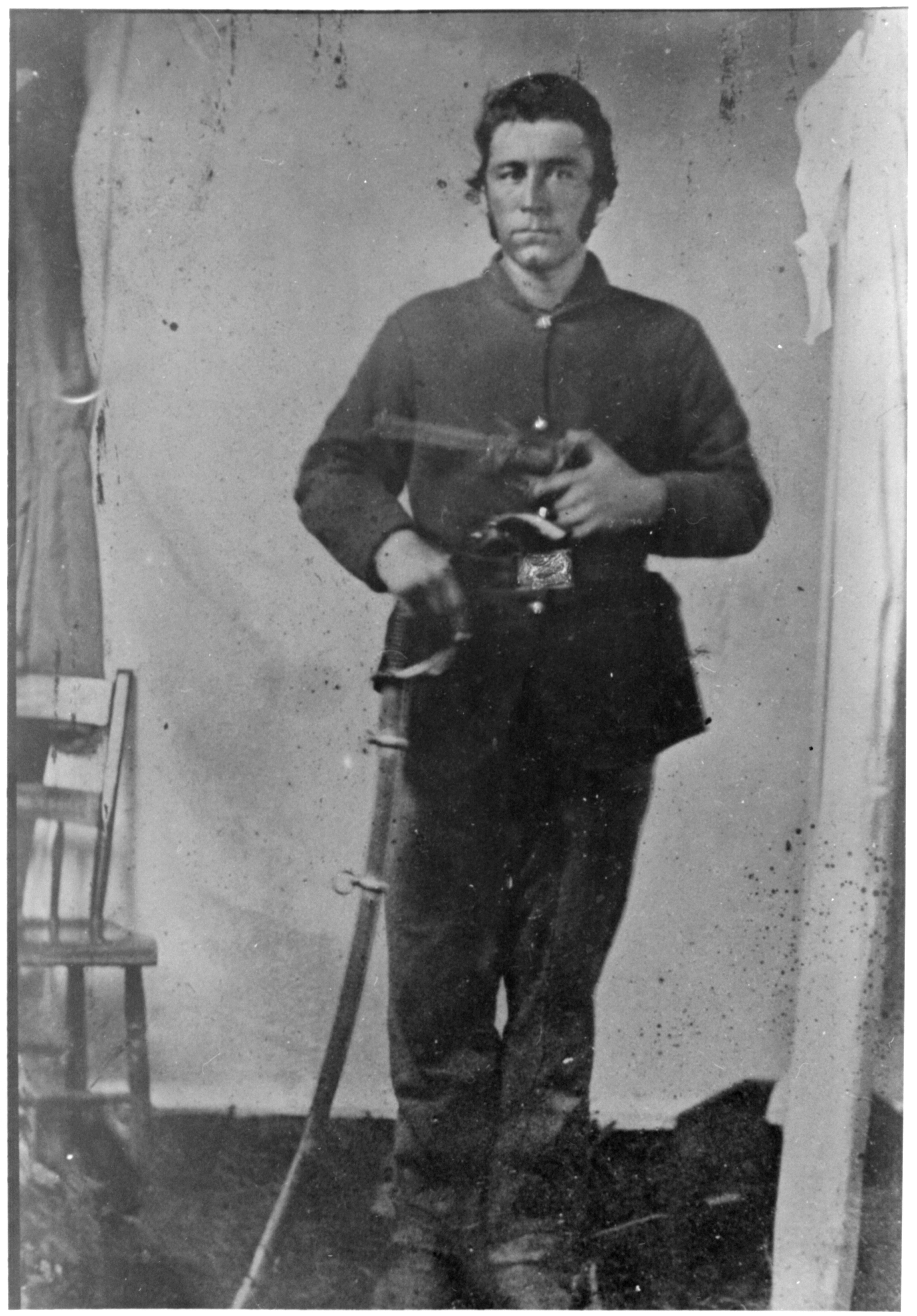 Man in Civil War Uniform in histroic black and white photo