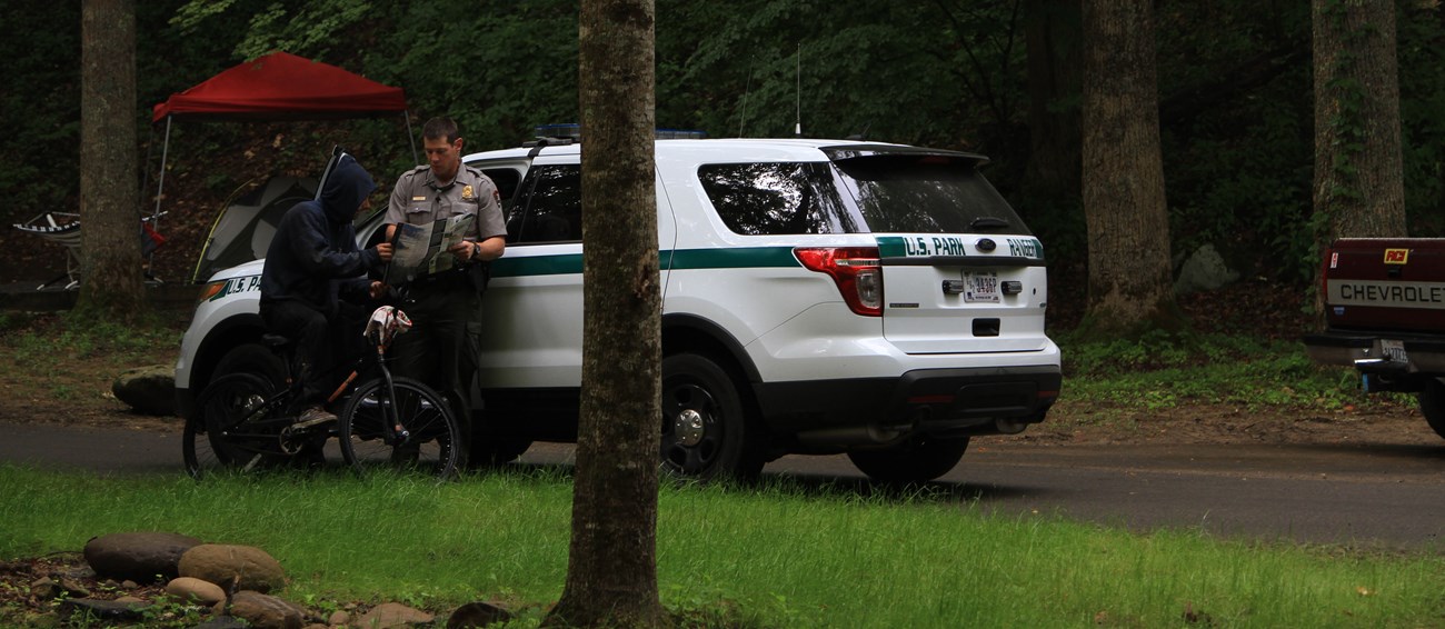 Ranger Assisting Visitor