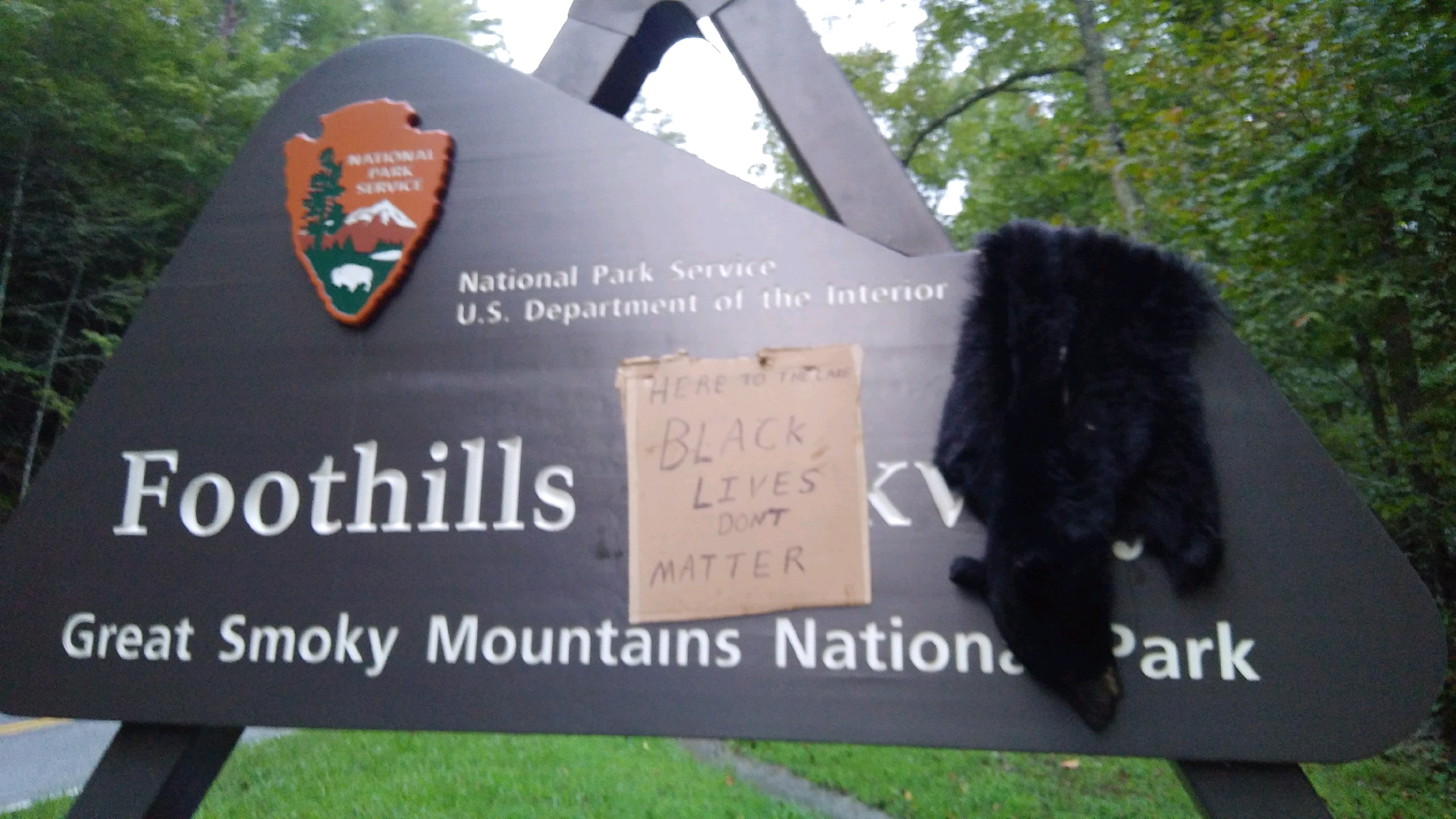 Photo of Vandalized Foothills Parkway Sign